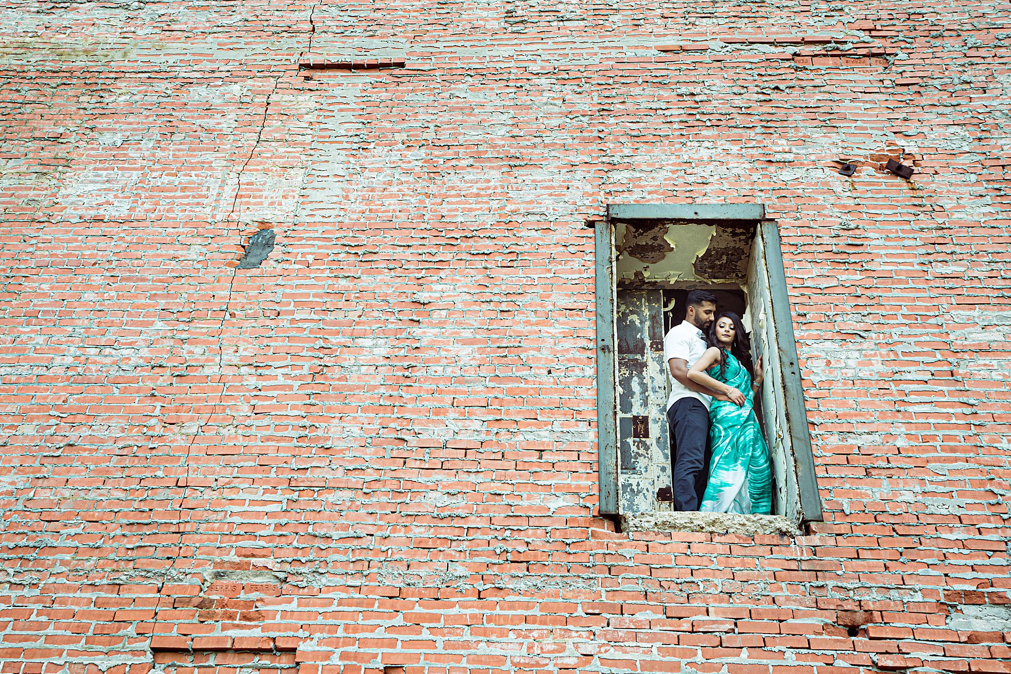 Sugar Land Imperial Factory photos with couple in green saari 