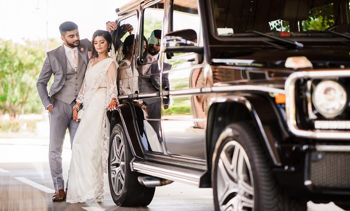 bride and groom with black mercedes gwagon